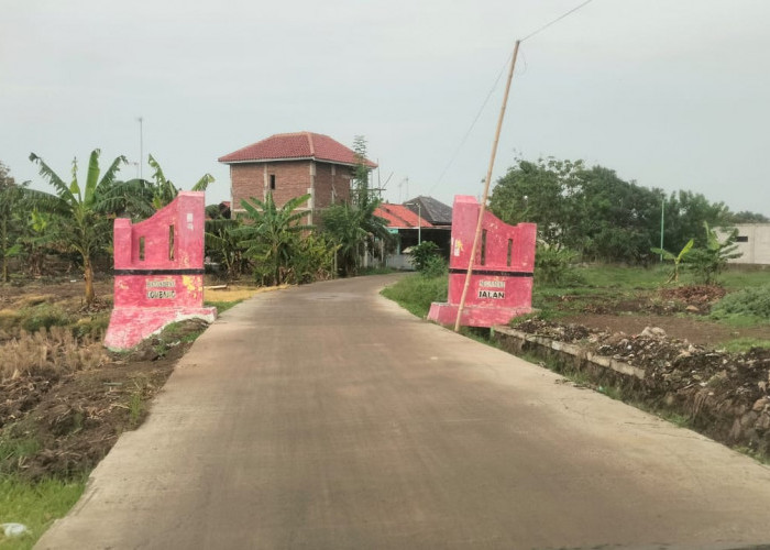 Jalan Penghubung Desa Lombang-Tinumpuk Mulus dan Baru Selesai Dibangun