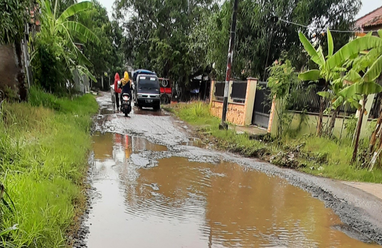 Diguyur Hujan, Jalan Balas Mirip Kubangan